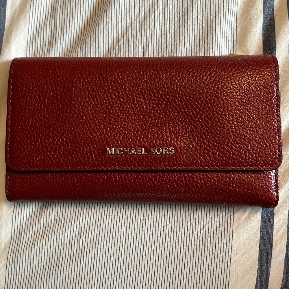 Red Michael Kors trifold wallet